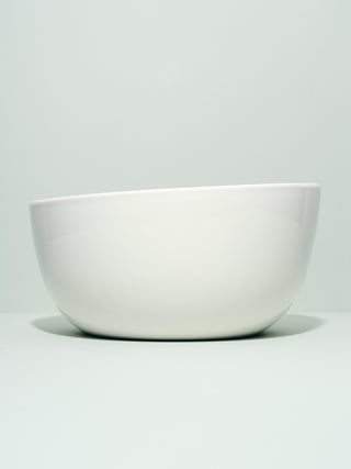 Deep serving bowl with slanted side